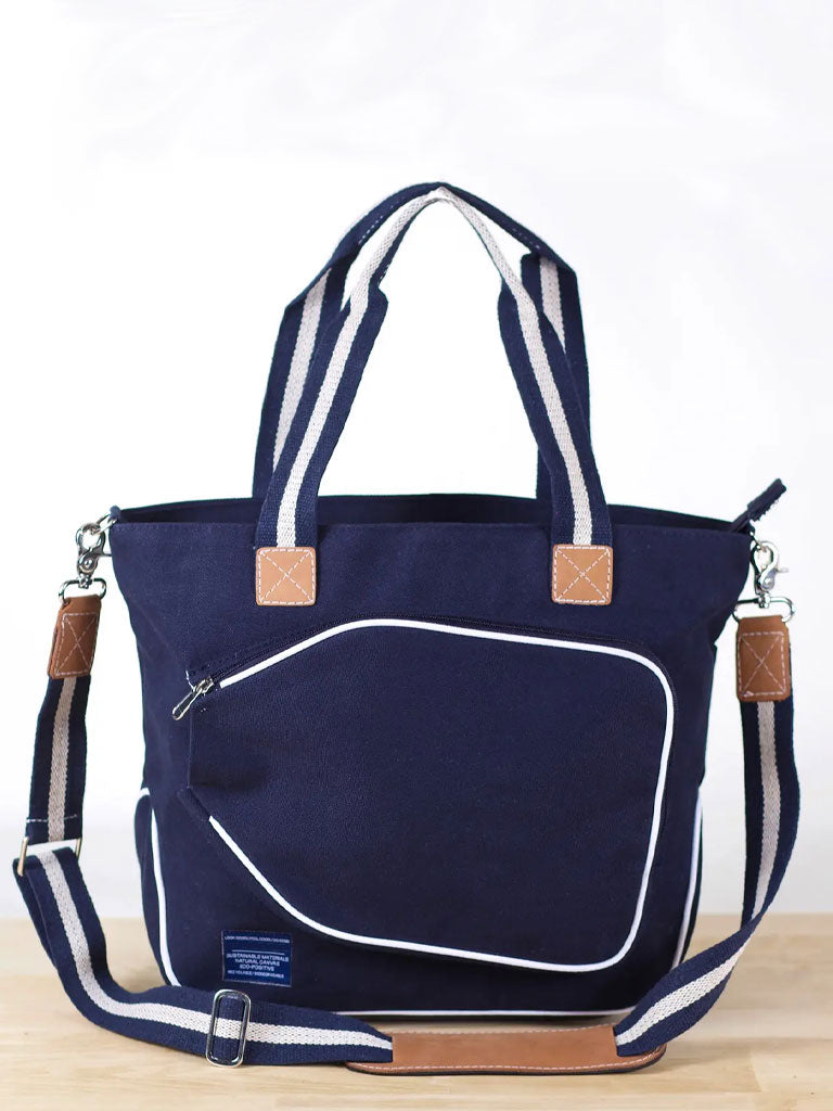 Navy blue canvas pickle ball bag.